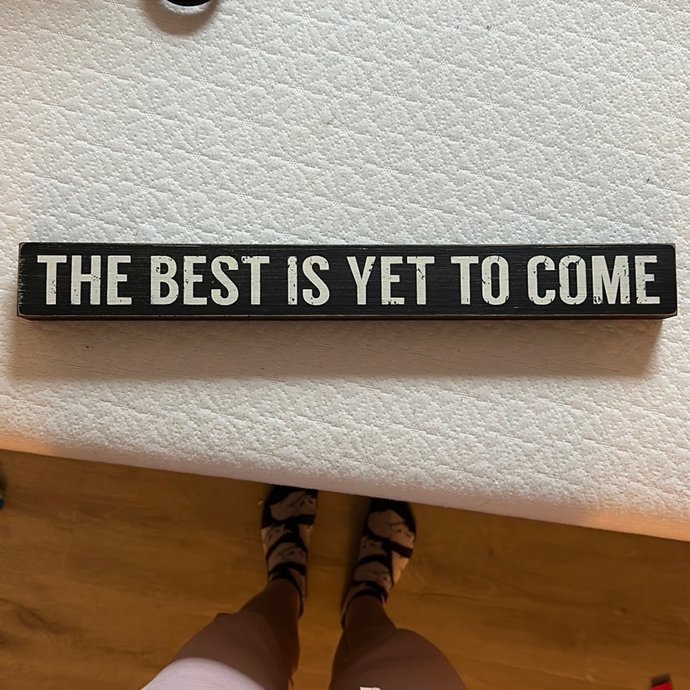 sign to sit on a table or find a way to hang